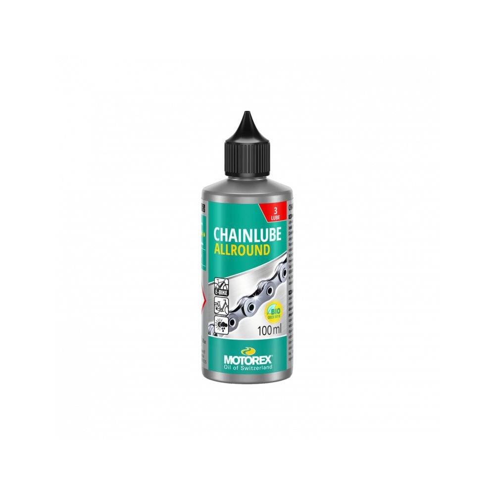 Motorex Chainlube Allround 100ml synthetic bike chain lubricant for dry conditions, shown in a workshop setting