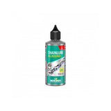 Motorex Chainlube Allround 100ml synthetic bike chain lubricant for dry conditions, shown in a workshop setting