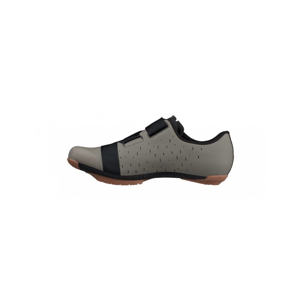 Fizik X4 Terra gravel cycling shoes with adjustable fit and durable outsole, shown from the side with laces and rugged design.