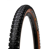 Hutchinson Tundra gravel tire 700x50 with tan wall, tubeless-ready, mounted on a bicycle wheel.