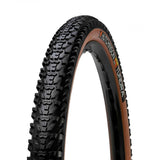 Hutchinson Tundra gravel tire 700x50 with tan wall, tubeless-ready, mounted on a bicycle wheel.