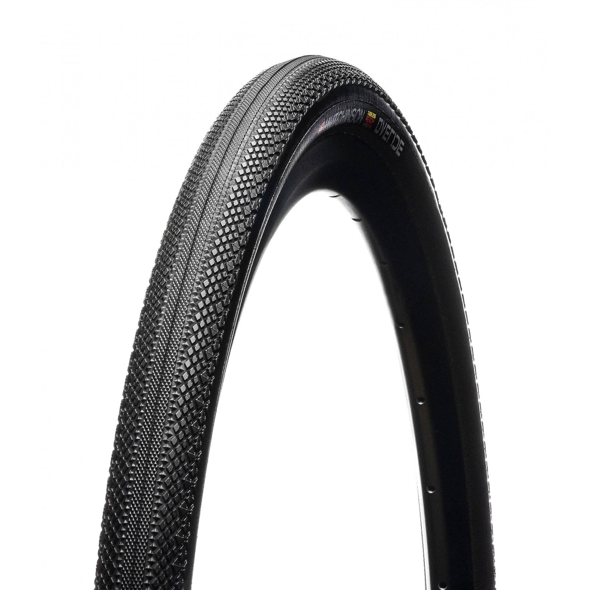 Hutchinson Overide Gravel Hardskin tubeless ready tire 700x40 with tan wall for gravel and cyclocross bikes, mounted on wheel.