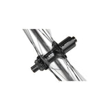DT Swiss HE 1800 HYBRID disc brake clincher wheel with 23x22mm rim and 100x12mm front hub for e-road cycling.