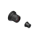 DT Swiss Ratchet DEG freehub conversion kit for Shimano Micro Spline 12mm hub, showing metal components and internal mechanisms.