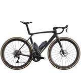 Trek Madone SLR 7 Gen 8 road bike with aero carbon frame and Shimano Ultegra Di2 shifters, positioned on a road.