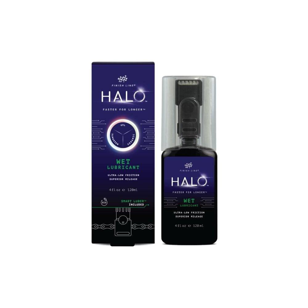 Finish Line Halo Wet Bicycle Chain Lubricant with Smart Luber™, shown in workshop setting for enhanced bike chain performance.