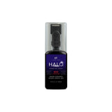 Finish Line Halo Wax bicycle chain lubricant with Smart Luber for drivetrain maintenance, shown in workshop setting.