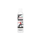 Finish Line Showroom Polish Ceramic Tech aerosol bike cleaner and protector in a workshop setting, displayed in a box of six.