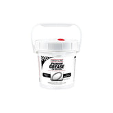 Finish Line Premium Ceramic Tech Grease tube for high-performance bike lubrication, shown in a workshop setting.