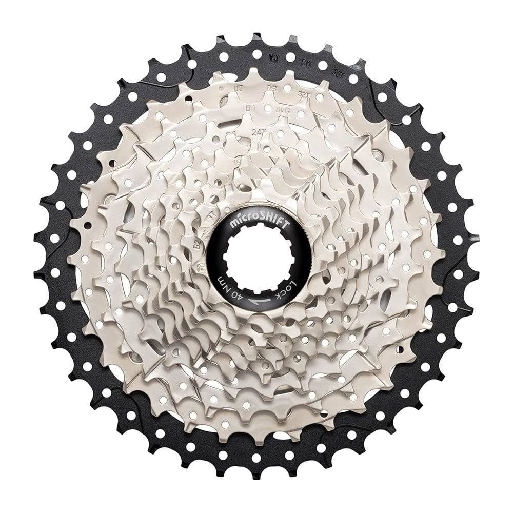 MicroSHIFT Microshift Sword G-Series 10-speed cassette with 11-38T gears for standard freehub wheels, shown on a bike wheel.