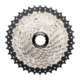 MicroSHIFT Microshift Sword G-Series 10-speed cassette with 11-38T gears for standard freehub wheels, shown on a bike wheel.
