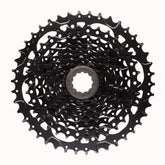 MicroSHIFT Acolyte H-Series 8-speed cassette for HG freehub, showing durable alloy construction and gear teeth details.