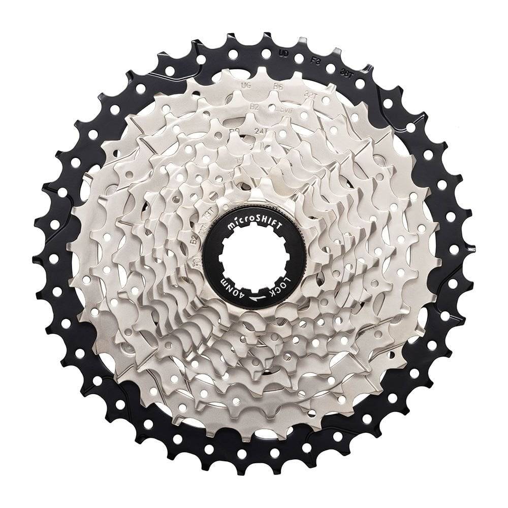 MicroSHIFT Sword H-Series 10-speed 11-38 cassette for standard freehub body, showing metal sprockets and gear teeth.