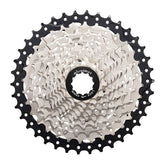 MicroSHIFT Sword H-Series 10-speed 11-38 cassette for standard freehub body, showing metal sprockets and gear teeth.