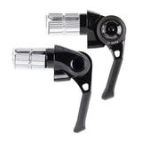 MicroShift road bike bar end shifters with index and friction modes mounted on drop handlebars for precise gear shifting.