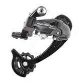 MicroSHIFT Mezzo 8/9 speed short cage rear derailleur for MTB and trekking bikes, showing the black component with derailleur cage.