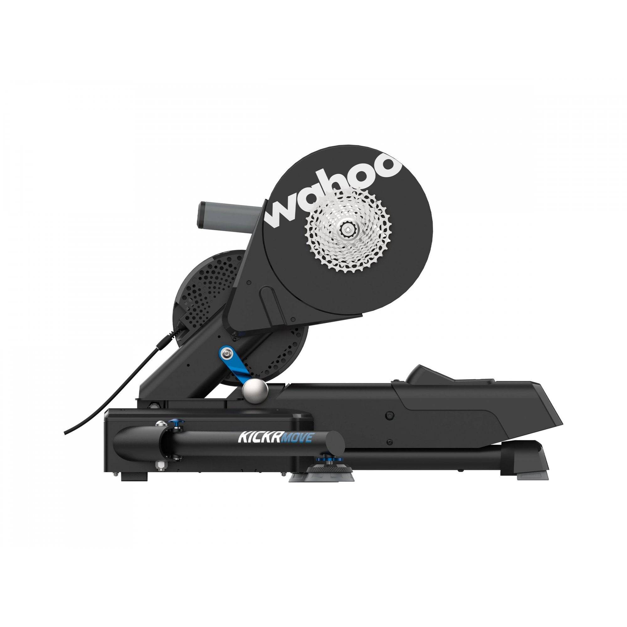 WAHOO KICKR MOVE smart indoor cycling trainer with realistic road feel, displayed with accessories for home cycling workouts.