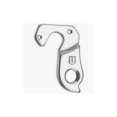M Part gear hanger for bike frame protection and replacement, mounted on a bicycle frame, showcasing durable component design.