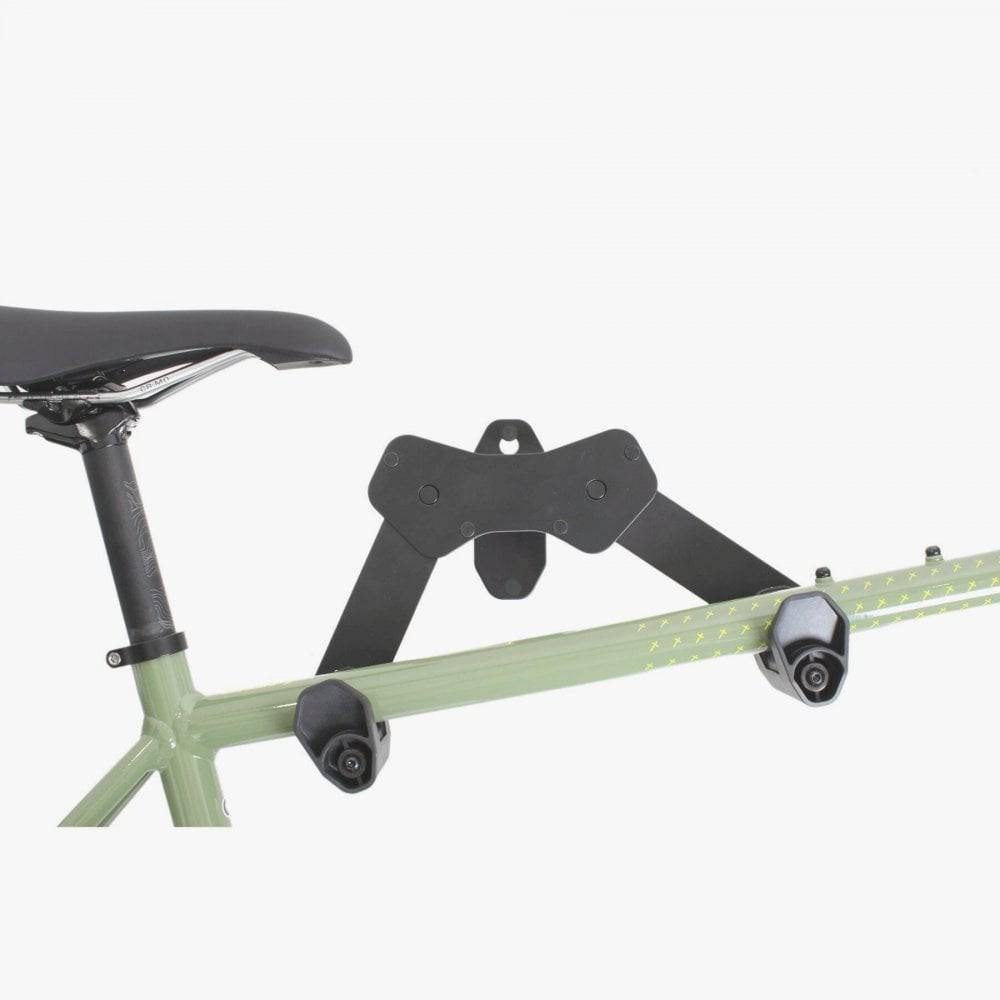 M Part wall-mounted horizontal bike rack with adjustable hooks and extension arm for secure bike storage.