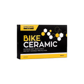 Gtechniq Bike Ceramic Kit with workshop tools, showcasing durable 24-month protective coating for motorcycle or bike maintenance.