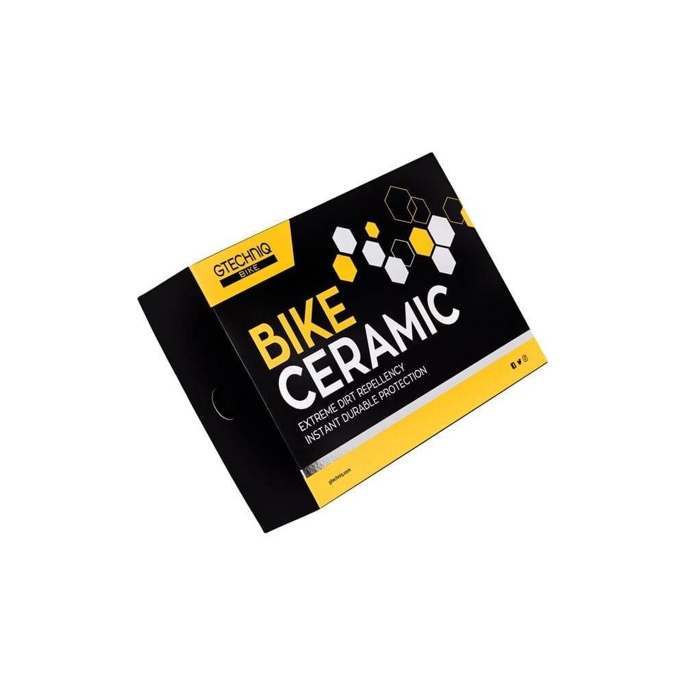 Gtechniq Bike Ceramic Kit workshop image showing application of durable 24-month protective coating on a motorcycle.