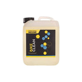 Gtechniq Bike Clean 5L professional bike cleaner in a workshop setting, removing dirt, grime, and oil from bicycle surfaces.