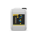 Gtechniq Bike Drivetrain Degreaser in a workshop setting, biodegradable concentrated cleaner for bike chains and cassettes.