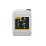 Gtechniq Bike Drivetrain Degreaser in a workshop setting, biodegradable concentrated cleaner for bike chains and cassettes.
