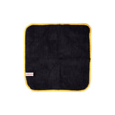 Gtechniq Bike Drying Towel, ultra-absorbent microfiber for scratch-free motorcycle drying, shown on a workshop surface