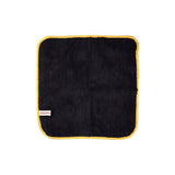 Gtechniq Bike Drying Towel, ultra-absorbent microfiber for scratch-free motorcycle drying, shown hanging on a workshop hook