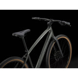 Trek Dual Sport 2 hybrid bike with Shimano 9-speed gears and hydraulic disc brakes, suitable for city and trail riding.