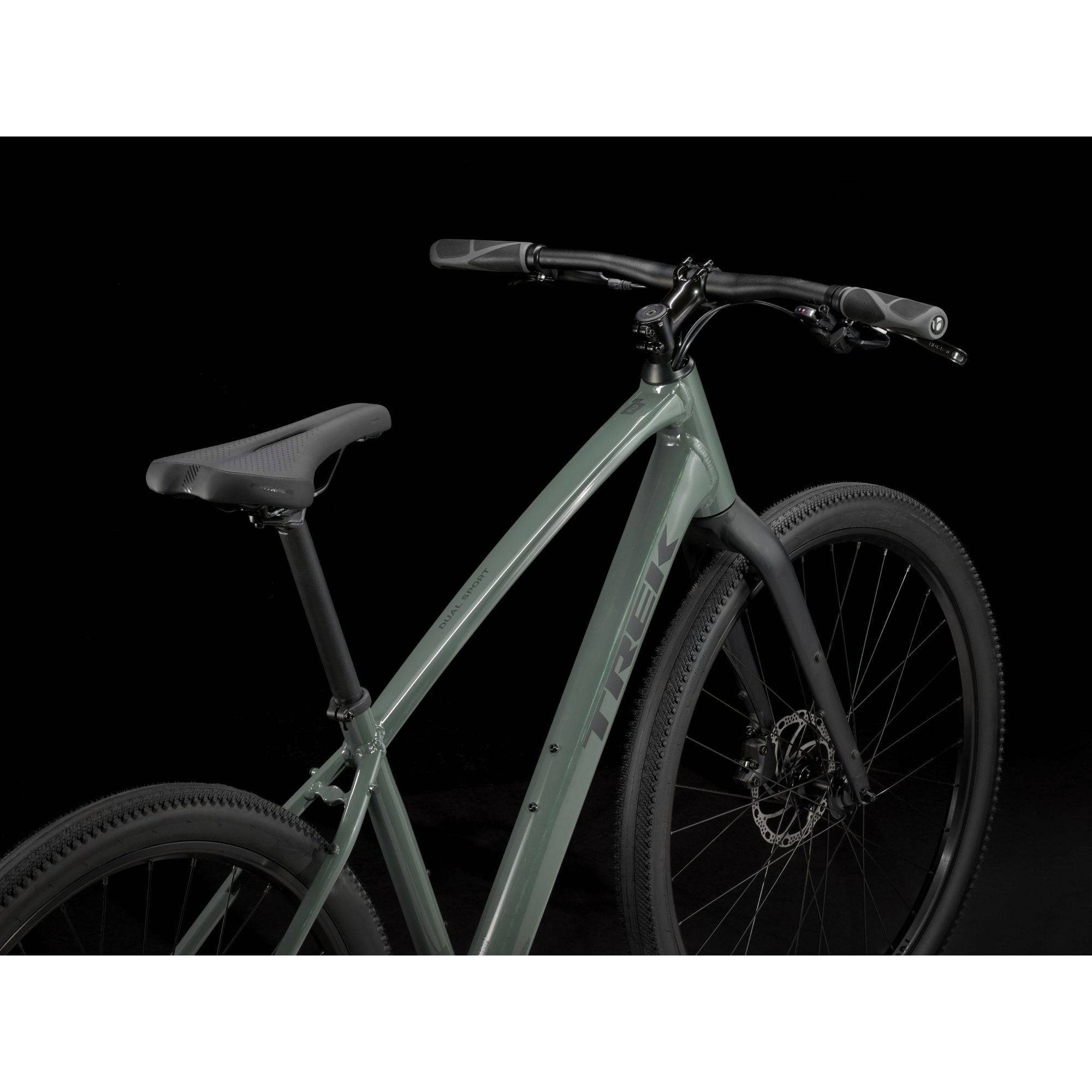 Trek Dual Sport 2 hybrid bike with Shimano 9-speed and hydraulic disc brakes, featuring a sleek frame and versatile tires.