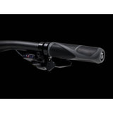 Trek Dual Sport 2 hybrid bike with Shimano 9-speed gears and hydraulic disc brakes, suitable for versatile riding.