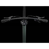 Trek Dual Sport 2 hybrid bike with Shimano 9-speed gears and hydraulic disc brakes, ready for versatile riding.