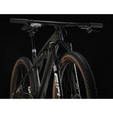 Trek Supercaliber SLR 9.9 Flight Attendant Gen 2 mountain bike for XC racing, featuring lightweight frame and advanced suspension system.
