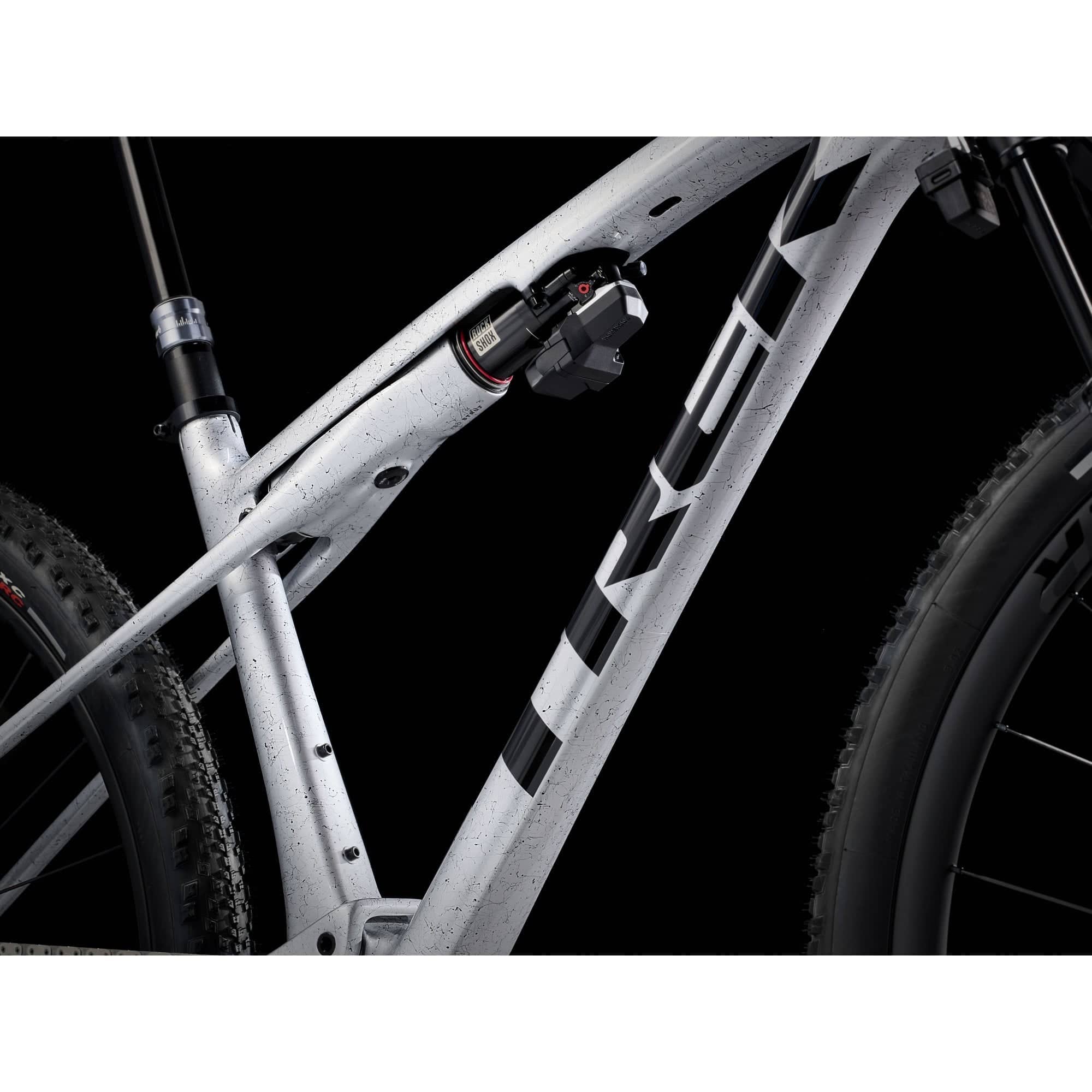 Trek Supercaliber SLR 9.9 Flight Attendant Gen 2 mountain bike for XC racing, featuring a lightweight frame and advanced suspension.