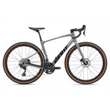 Giant Revolt Advanced 0 gravel bike with adjustable wheelbase and integrated storage, shown with sleek frame and off-road tires.