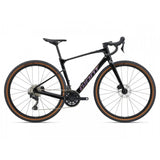 Giant Revolt Advanced 2 gravel bike with adjustable wheelbase and integrated storage, shown on a scenic trail.