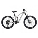 Giant Faith 24 youth mountain bike with suspension and dropper seatpost, featuring durable frame and knobby tires for trail riding.