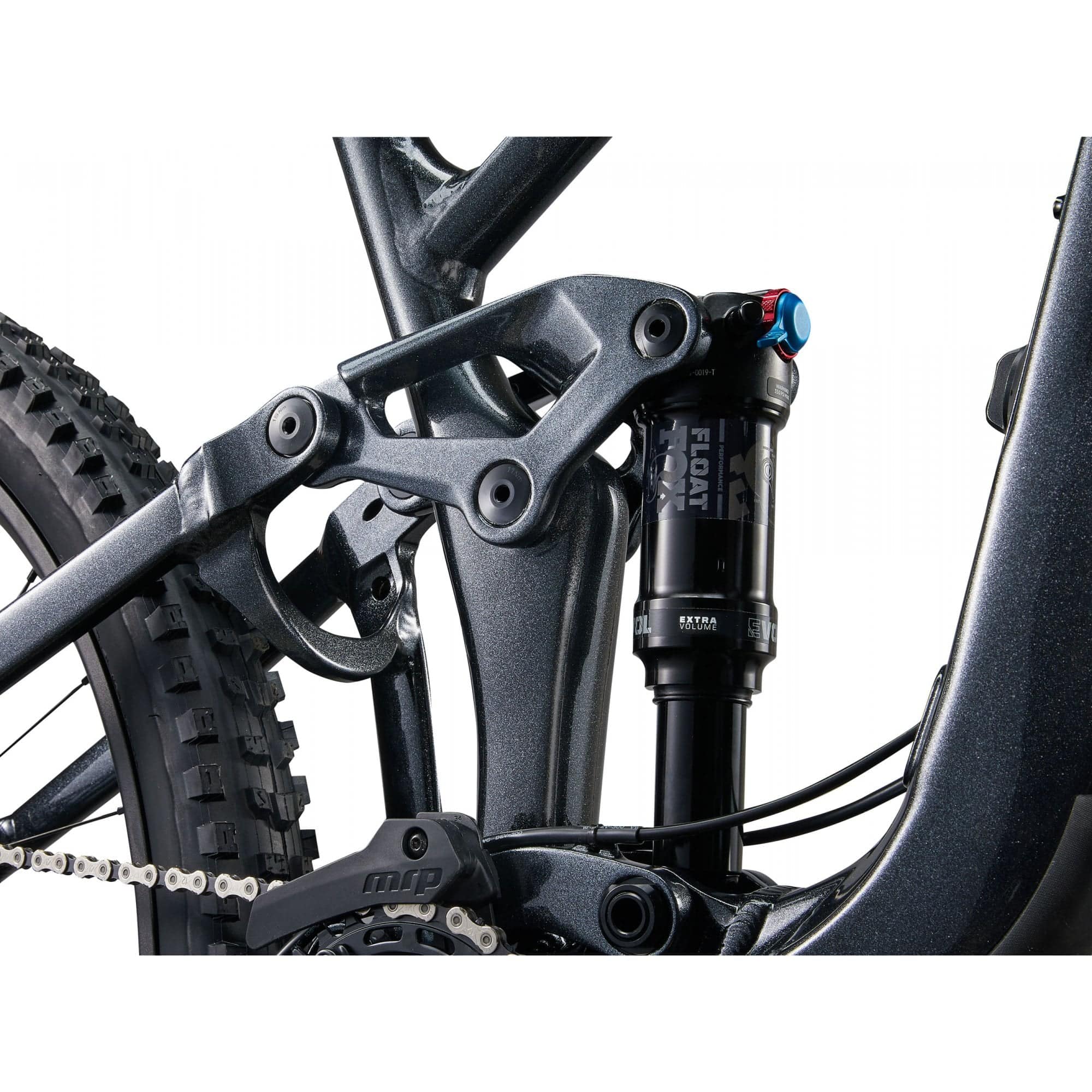 Liv Intrigue X 1 mountain bike with 29-inch wheels, adjustable geometry, and suspension, shown in a natural outdoor setting.