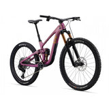 Liv Intrigue X Advanced 0 mountain bike with adjustable geometry and suspension system, featuring a sleek frame and knobby tires.