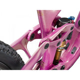 Liv Intrigue X Advanced 0 mountain bike with adjustable geometry and suspension system, shown with sleek frame and rugged tires.