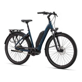 Giant EXPRESSION E+ 1 e-hybrid bike with Shimano Nexus gears and SyncDrive Core motor, parked on a city street.