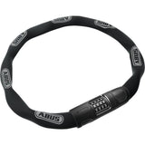 ABUS 8808C/110 BK plastic-coated chain lock with combination for bike security, showing the black chain and lock mechanism.