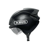 ABUS GAMECHANGER triathlon helmet with aerodynamic design and magnetic fastener, shown in a close-up view of the helmet.