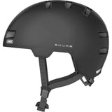 ABUS Skurb helmet for urban sports and commuting, shown on a model, lightweight protective headgear with ventilation.