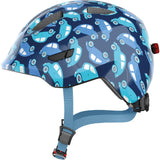 ABUS Smiley 3.0 LED kids cycling helmet with adjustable fit, integrated LED lights, and deep safety protection.