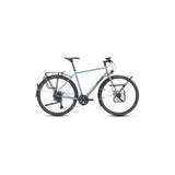 Genesis Tour De Fer 30 adventure bike with disc brakes, designed for long-distance touring, shown in a scenic outdoor setting.