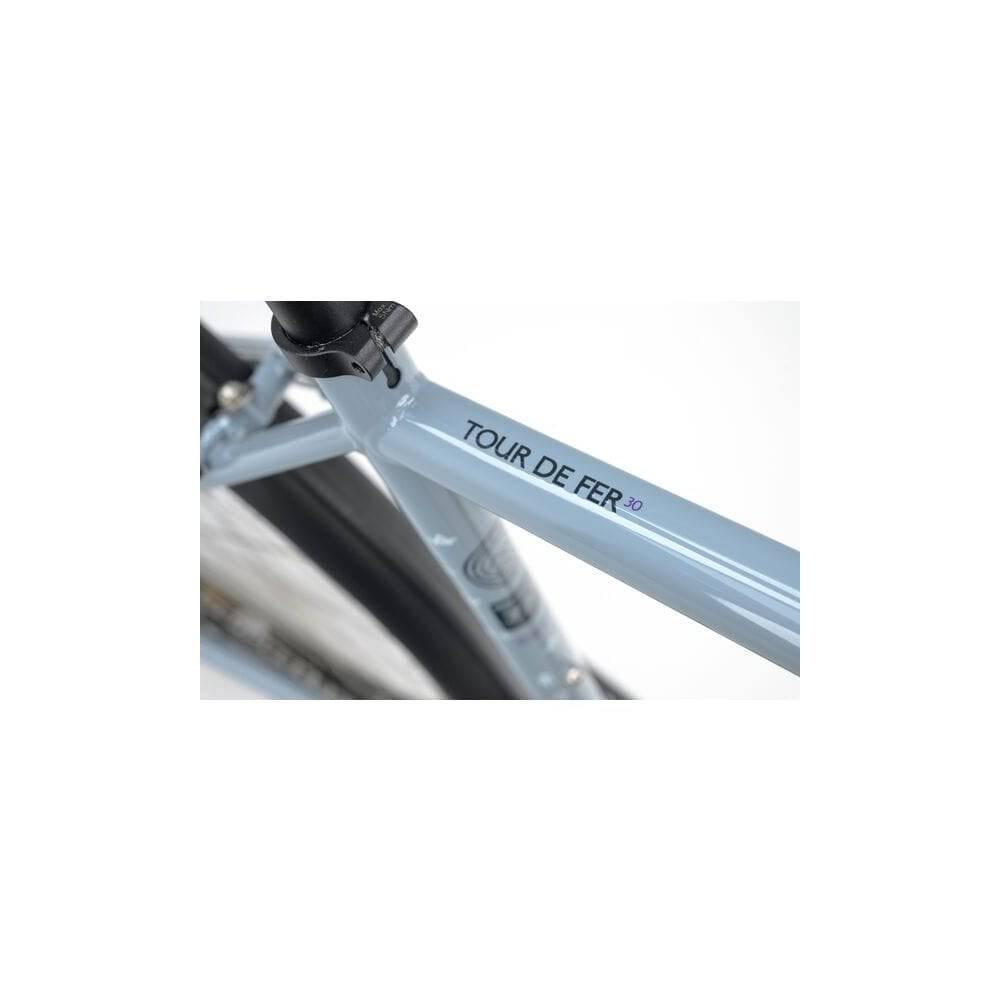 Genesis Tour De Fer 30 adventure bike with disc brakes, designed for long-distance touring, 2025 model, shown with rugged tires and frame