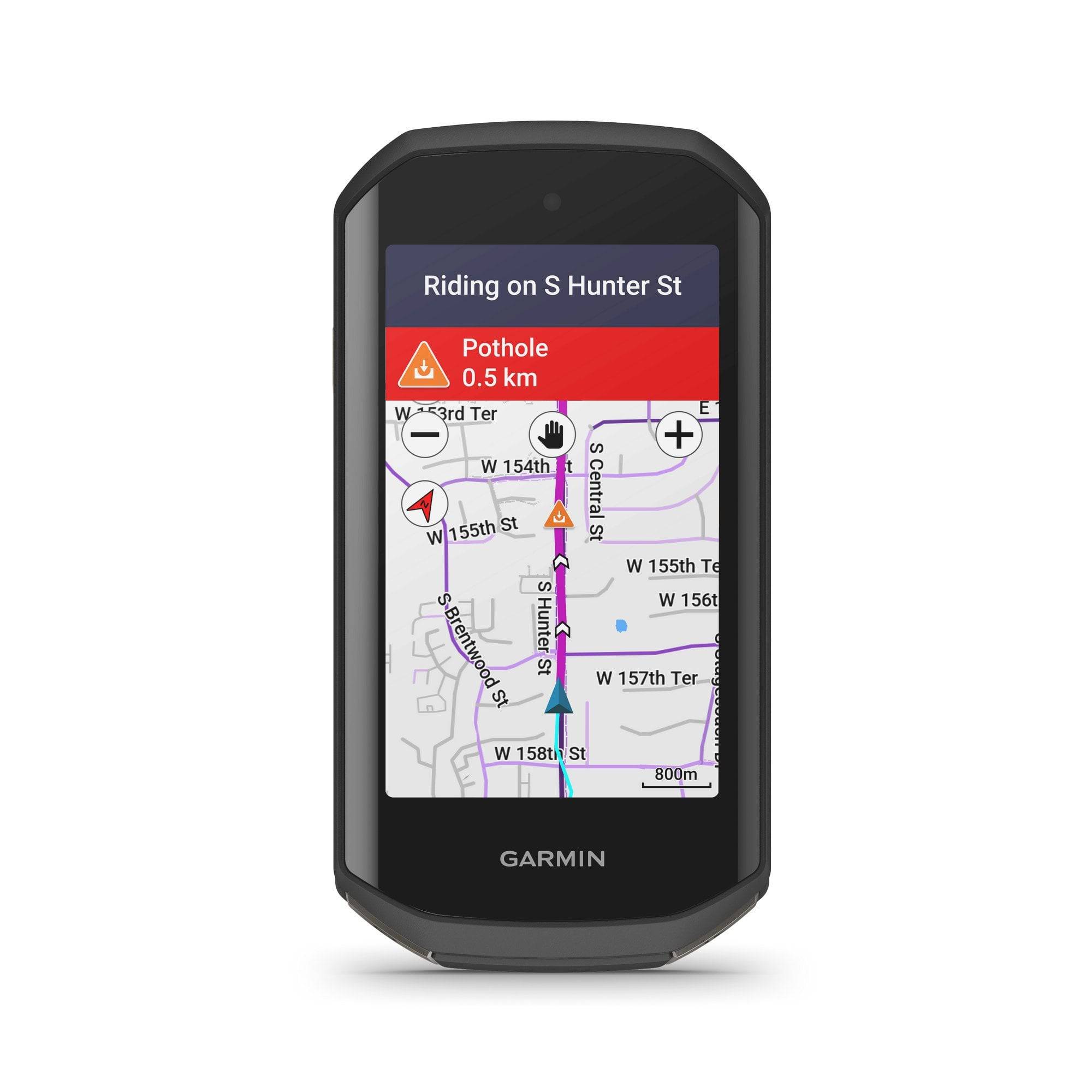 Garmin Edge 1050 GPS bike computer with HRM-Dual heart rate monitor, speed, and cadence sensors attached.